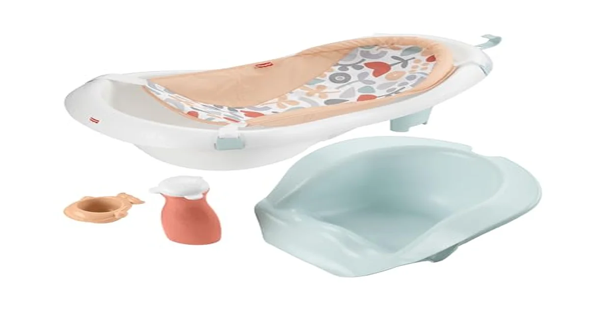 Baby bath tub on a clean white background with soft towels