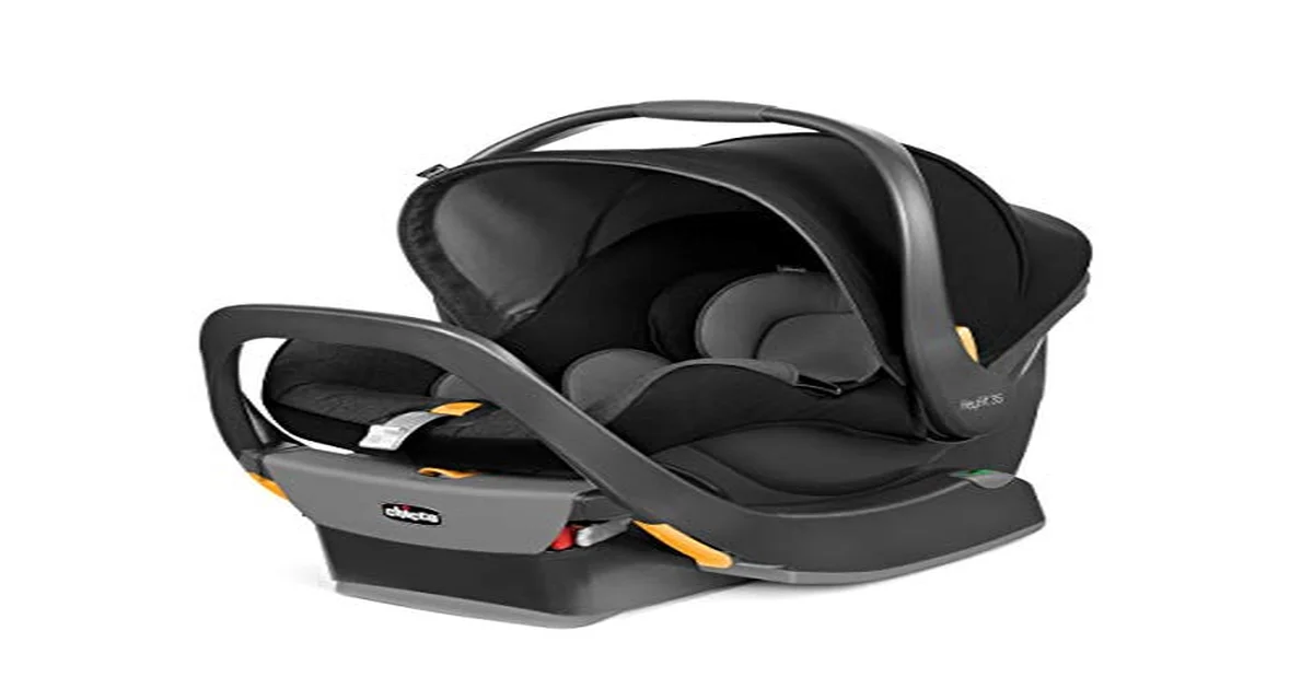 Infant car seat safely installed in the back seat of a car